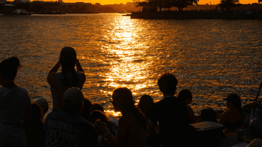 Sunset at Sydney Harbour Bridge with Silhouetted Crowd