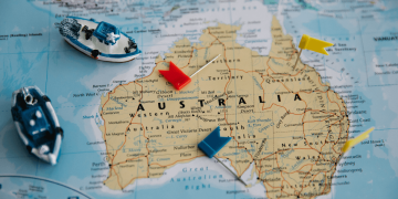 Toy Ships and Flags on Australian Map