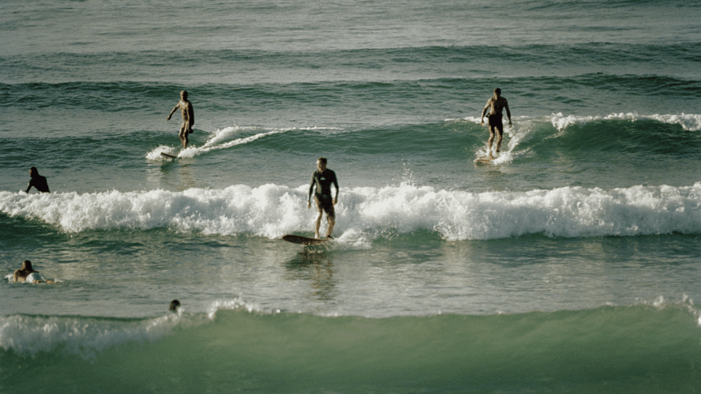 Surfers at Byron Bay Beach
