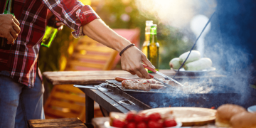 Young Man Roasting Barbecue