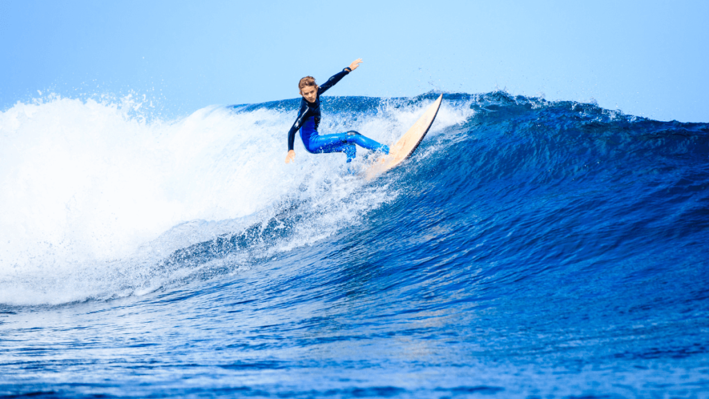 kid learning to surf